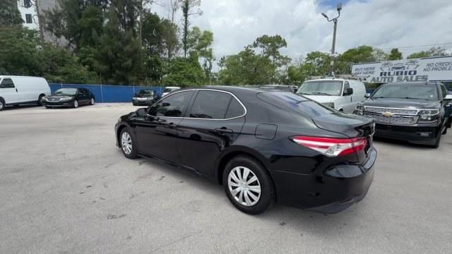 2018 Black Toyota Camry L (4T1B11HK7JU) with an 4 2.5 L engine, Automatic transmission, located at 27610 S Dixie Hwy, Homestead, FL, 33032, (305) 749-2348, 25.510241, -80.438301 - KBB.com 10 Most Awarded Cars. This Toyota Camry boasts a Regular Unleaded I-4 2.5 L/152 engine powering this Automatic transmission. Window Grid Antenna, Variable Intermittent Wipers, Valet Function.* This Toyota Camry Features the Following Options *Trunk Rear Cargo Access, Trip Computer, Toyota Sa- Photo#2