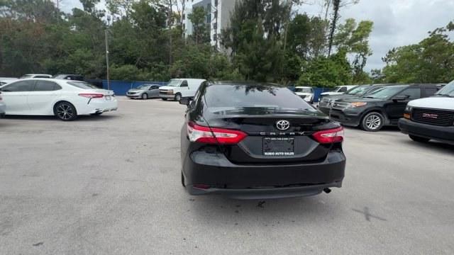 2018 Black Toyota Camry L (4T1B11HK7JU) with an 4 2.5 L engine, Automatic transmission, located at 27610 S Dixie Hwy, Homestead, FL, 33032, (305) 749-2348, 25.510241, -80.438301 - KBB.com 10 Most Awarded Cars. This Toyota Camry boasts a Regular Unleaded I-4 2.5 L/152 engine powering this Automatic transmission. Window Grid Antenna, Variable Intermittent Wipers, Valet Function.* This Toyota Camry Features the Following Options *Trunk Rear Cargo Access, Trip Computer, Toyota Sa- Photo#3