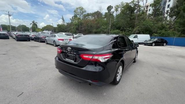2018 Black Toyota Camry L (4T1B11HK7JU) with an 4 2.5 L engine, Automatic transmission, located at 27610 S Dixie Hwy, Homestead, FL, 33032, (305) 749-2348, 25.510241, -80.438301 - KBB.com 10 Most Awarded Cars. This Toyota Camry boasts a Regular Unleaded I-4 2.5 L/152 engine powering this Automatic transmission. Window Grid Antenna, Variable Intermittent Wipers, Valet Function.* This Toyota Camry Features the Following Options *Trunk Rear Cargo Access, Trip Computer, Toyota Sa- Photo#4