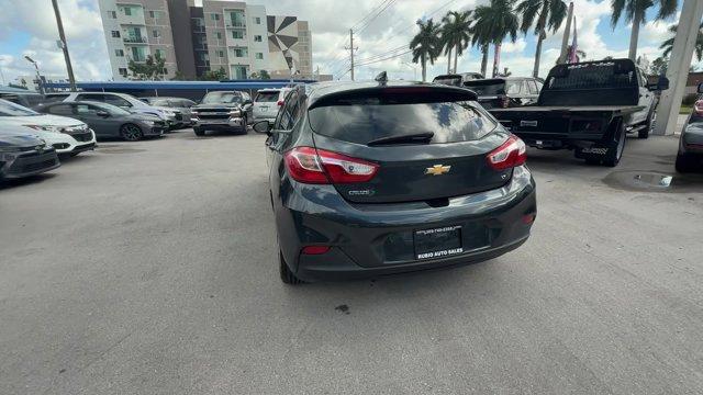 2018 Graphite Metallic /Jet Black Chevrolet Cruze LT (3G1BE6SM0JS) with an 4 1.4L engine, Automatic transmission, located at 27610 S Dixie Hwy, Homestead, FL, 33032, (305) 749-2348, 25.510241, -80.438301 - KBB.com 10 Most Awarded Brands. Scores 38 Highway MPG and 29 City MPG! This Chevrolet Cruze boasts a Turbocharged Gas I4 1.4L/ engine powering this Automatic transmission. WHEELS, 16 (40.6 CM) ALUMINUM (STD), VISORS, DRIVER AND FRONT PASSENGER ILLUMINATED VANITY MIRRORS, TRANSMISSION, 6-SPEED AUTOMA - Photo#3