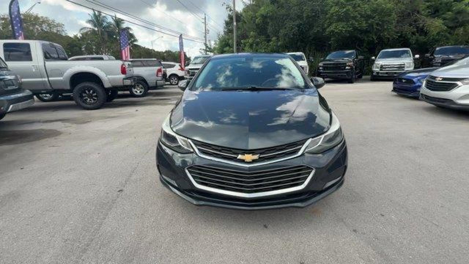 2018 Graphite Metallic /Jet Black Chevrolet Cruze LT (3G1BE6SM0JS) with an 4 1.4L engine, Automatic transmission, located at 27610 S Dixie Hwy, Homestead, FL, 33032, (305) 749-2348, 25.510241, -80.438301 - KBB.com 10 Most Awarded Brands. Scores 38 Highway MPG and 29 City MPG! This Chevrolet Cruze boasts a Turbocharged Gas I4 1.4L/ engine powering this Automatic transmission. WHEELS, 16 (40.6 CM) ALUMINUM (STD), VISORS, DRIVER AND FRONT PASSENGER ILLUMINATED VANITY MIRRORS, TRANSMISSION, 6-SPEED AUTOMA - Photo#7