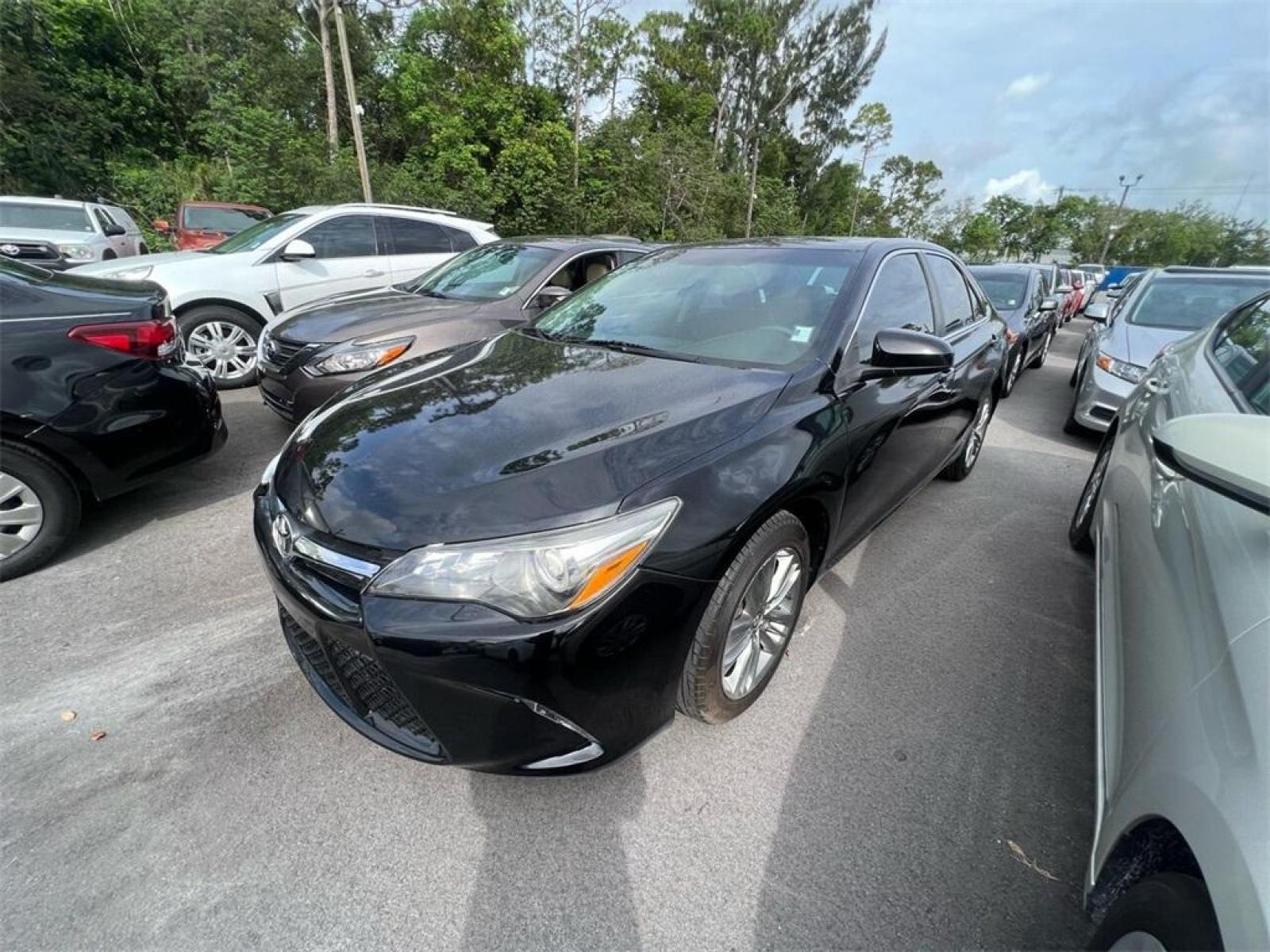 2016 Midnight Black Metallic /Black/Blue Toyota Camry Special Edition (4T1BF1FK2GU) with an 2.5L I4 SMPI DOHC engine, Automatic transmission, located at 27610 S Dixie Hwy, Homestead, FL, 33032, (305) 749-2348, 25.510241, -80.438301 - Photo #0