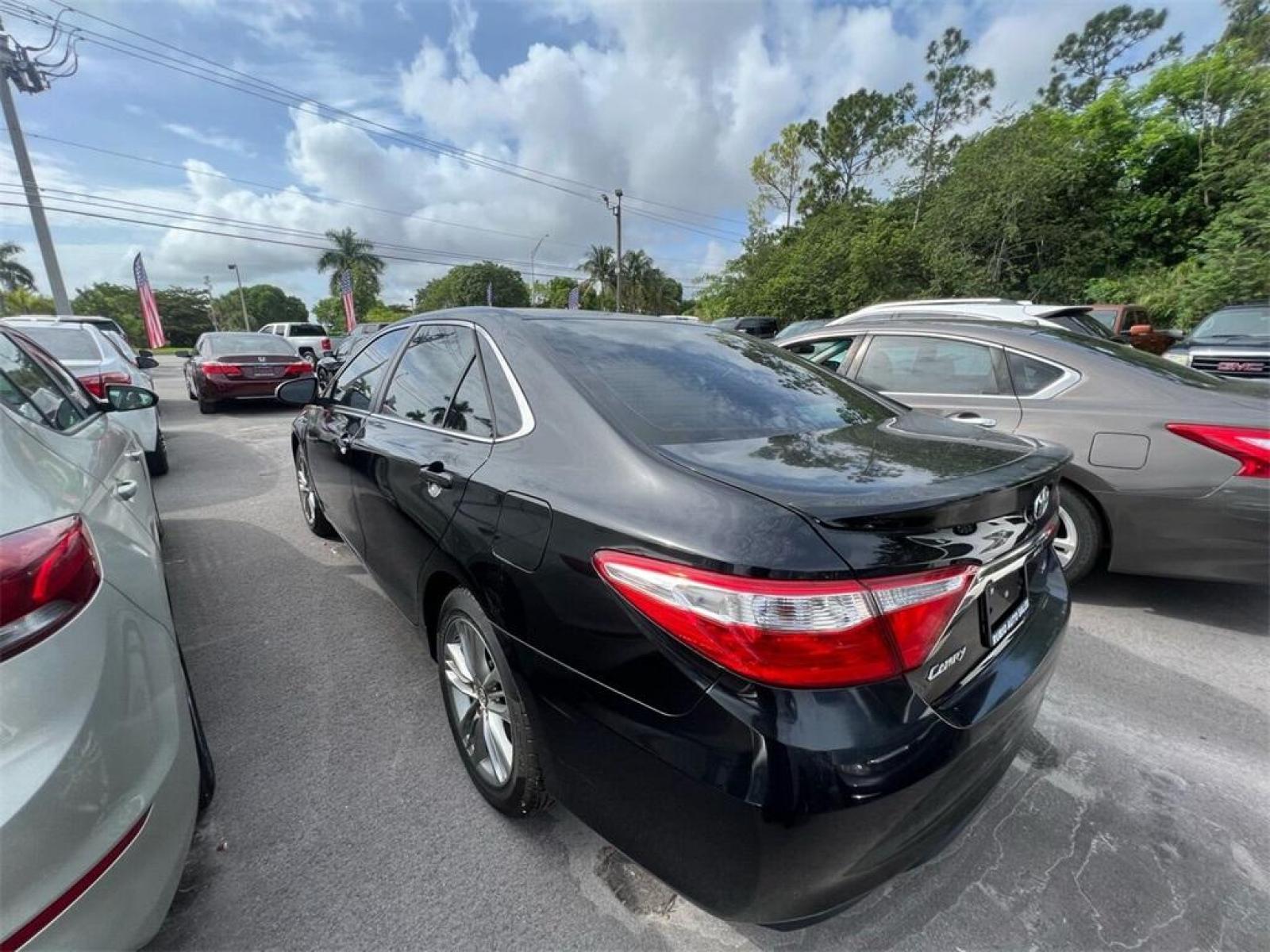 2016 Midnight Black Metallic /Black/Blue Toyota Camry Special Edition (4T1BF1FK2GU) with an 2.5L I4 SMPI DOHC engine, Automatic transmission, located at 27610 S Dixie Hwy, Homestead, FL, 33032, (305) 749-2348, 25.510241, -80.438301 - Photo #1