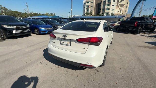 2017 Snow White Pearl /Black Kia Forte (3KPFL4A80HE) with an 4 2.0 L engine, Automatic transmission, located at 27610 S Dixie Hwy, Homestead, FL, 33032, (305) 749-2348, 25.510241, -80.438301 - KBB.com 10 Most Awarded Brands. Only 79,834 Miles! Scores 33 Highway MPG and 25 City MPG! This Kia Forte delivers a Regular Unleaded I-4 2.0 L/122 engine powering this Automatic transmission. SNOW WHITE PEARL, CARPETED FLOOR MATS, BLACK, LEATHER SEAT TRIM.*This Kia Forte Comes Equipped with These Op - Photo#4