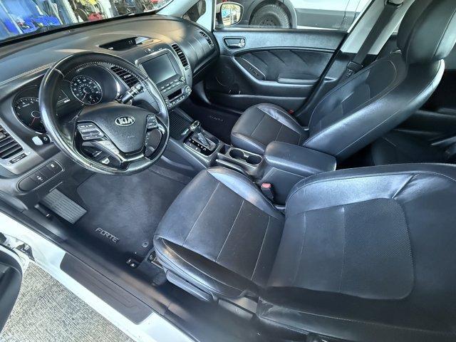 2017 Snow White Pearl /Black Kia Forte (3KPFL4A80HE) with an 4 2.0 L engine, Automatic transmission, located at 27610 S Dixie Hwy, Homestead, FL, 33032, (305) 749-2348, 25.510241, -80.438301 - KBB.com 10 Most Awarded Brands. Only 79,834 Miles! Scores 33 Highway MPG and 25 City MPG! This Kia Forte delivers a Regular Unleaded I-4 2.0 L/122 engine powering this Automatic transmission. SNOW WHITE PEARL, CARPETED FLOOR MATS, BLACK, LEATHER SEAT TRIM.*This Kia Forte Comes Equipped with These Op - Photo#10