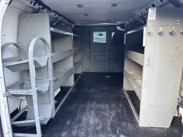 2014 Summit White /Medium Pewter Chevrolet Express Cargo Van (1GCSGAFX2E1) with an 6 4.3L engine, Automatic transmission, located at 27610 S Dixie Hwy, Homestead, FL, 33032, (305) 749-2348, 25.510241, -80.438301 - KBB.com Brand Image Awards. Scores 19 Highway MPG and 14 City MPG! This Chevrolet Express Cargo Van boasts a Gas V6 4.3L/262 engine powering this Automatic transmission. TRANSMISSION, 4-SPEED AUTOMATIC, ELECTRONICALLY CONTROLLED with overdrive, tow/haul mode and internal transmission oil cooler (STD - Photo#9