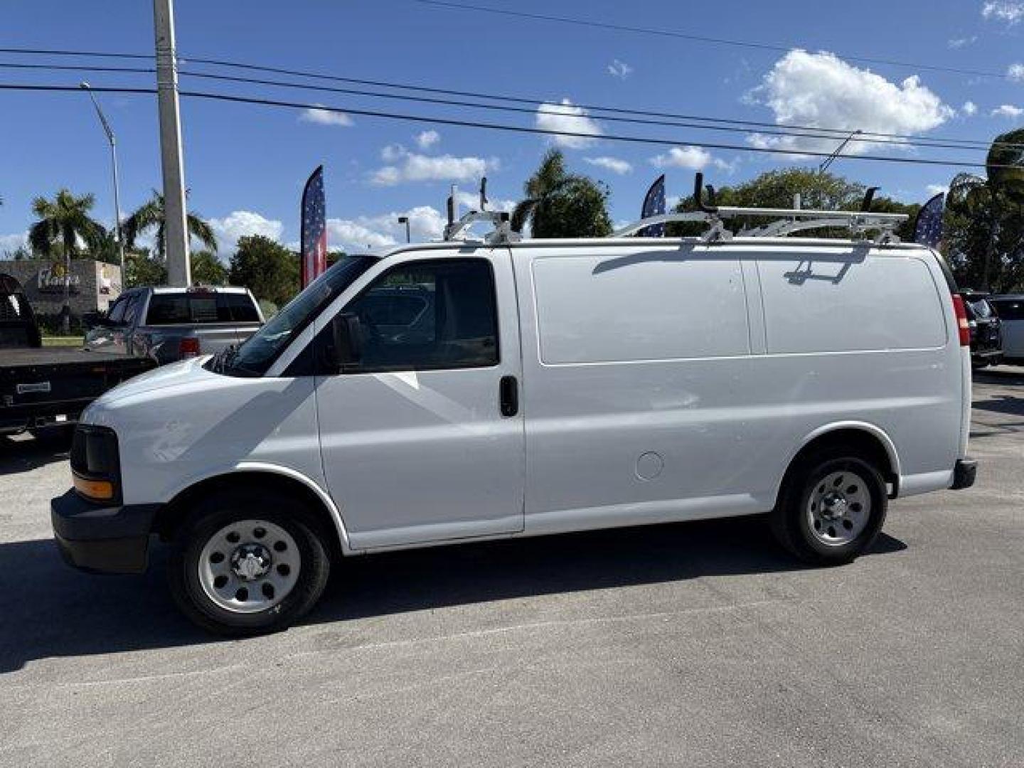 2014 Summit White /Medium Pewter Chevrolet Express Cargo Van (1GCSGAFX2E1) with an 6 4.3L engine, Automatic transmission, located at 27610 S Dixie Hwy, Homestead, FL, 33032, (305) 749-2348, 25.510241, -80.438301 - KBB.com Brand Image Awards. Scores 19 Highway MPG and 14 City MPG! This Chevrolet Express Cargo Van boasts a Gas V6 4.3L/262 engine powering this Automatic transmission. TRANSMISSION, 4-SPEED AUTOMATIC, ELECTRONICALLY CONTROLLED with overdrive, tow/haul mode and internal transmission oil cooler (STD - Photo#1