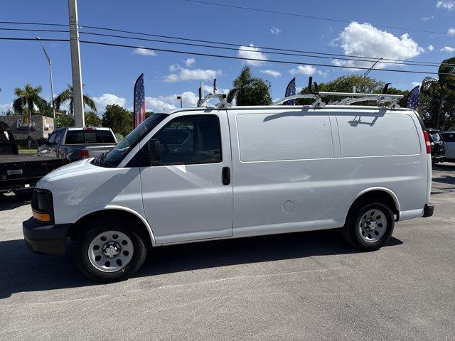 2014 Summit White /Medium Pewter Chevrolet Express Cargo Van (1GCSGAFX2E1) with an 6 4.3L engine, Automatic transmission, located at 27610 S Dixie Hwy, Homestead, FL, 33032, (305) 749-2348, 25.510241, -80.438301 - KBB.com Brand Image Awards. Scores 19 Highway MPG and 14 City MPG! This Chevrolet Express Cargo Van boasts a Gas V6 4.3L/262 engine powering this Automatic transmission. TRANSMISSION, 4-SPEED AUTOMATIC, ELECTRONICALLY CONTROLLED with overdrive, tow/haul mode and internal transmission oil cooler (STD - Photo#1