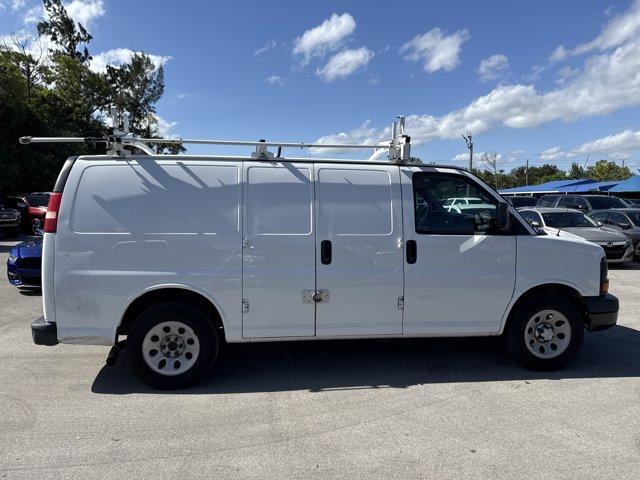 2014 Summit White /Medium Pewter Chevrolet Express Cargo Van (1GCSGAFX2E1) with an 6 4.3L engine, Automatic transmission, located at 27610 S Dixie Hwy, Homestead, FL, 33032, (305) 749-2348, 25.510241, -80.438301 - KBB.com Brand Image Awards. Scores 19 Highway MPG and 14 City MPG! This Chevrolet Express Cargo Van boasts a Gas V6 4.3L/262 engine powering this Automatic transmission. TRANSMISSION, 4-SPEED AUTOMATIC, ELECTRONICALLY CONTROLLED with overdrive, tow/haul mode and internal transmission oil cooler (STD - Photo#5