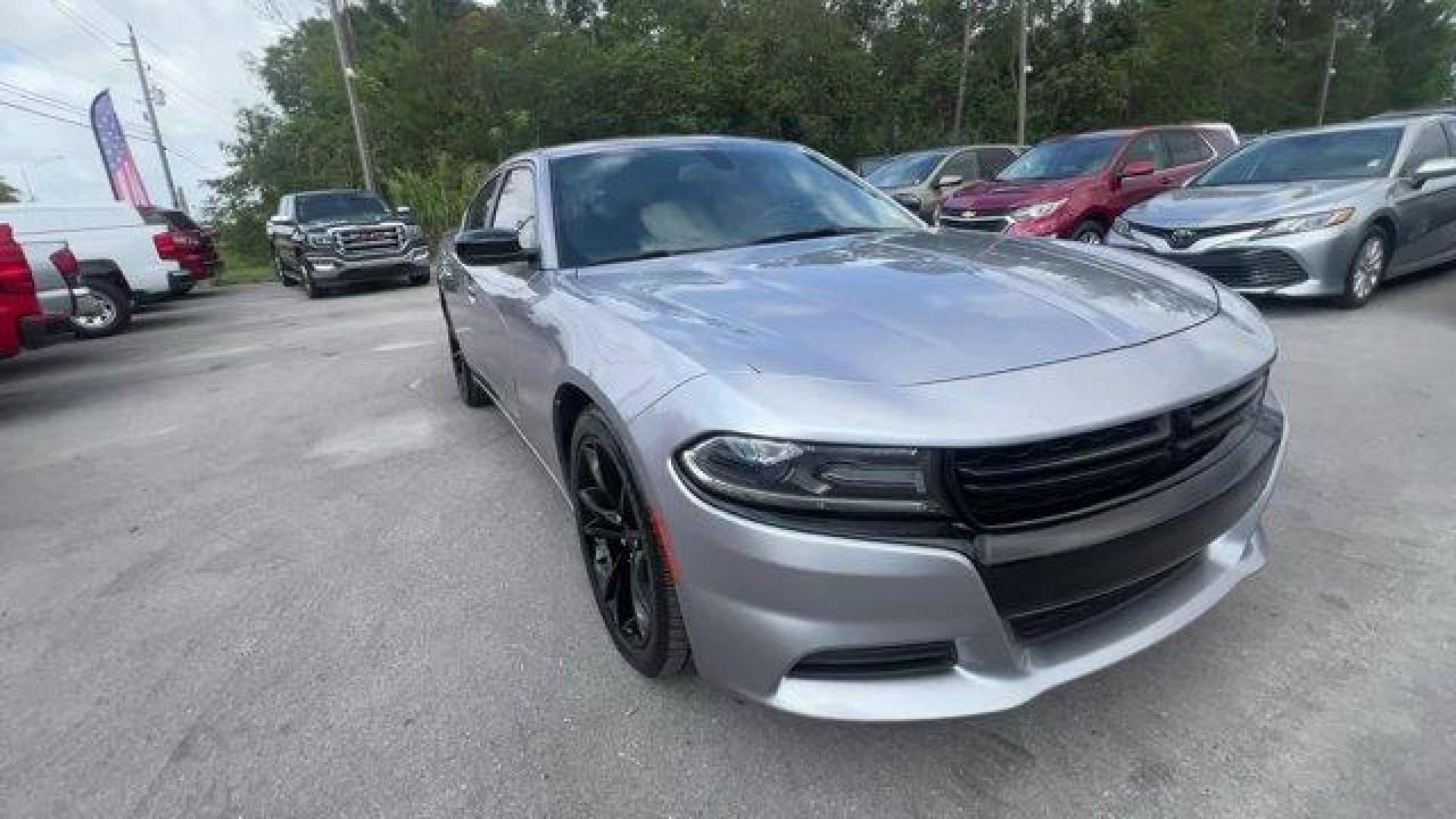 2016 Billet Clearcoat /Black Dodge Charger (2C3CDXBG4GH) with an 6 3.6 L engine, Automatic transmission, located at 27610 S Dixie Hwy, Homestead, FL, 33032, (305) 749-2348, 25.510241, -80.438301 - KBB.com 10 Best Used Cars Under $20,000. Only 69,245 Miles! Delivers 31 Highway MPG and 19 City MPG! This Dodge Charger delivers a Regular Unleaded V-6 3.6 L/220 engine powering this Automatic transmission. WHEELS: 20 X 8.0 GLOSS BLACK PAINTED ALUMINUM, TRANSMISSION: 8-SPEED AUTO (8HP45) (STD), TIRE - Photo#6