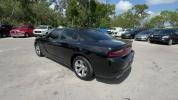 2016 Pitch Black Clearcoat /Black Dodge Charger (2C3CDXHG3GH) with an 6 3.6 L engine, Automatic transmission, located at 27610 S Dixie Hwy, Homestead, FL, 33032, (305) 749-2348, 25.510241, -80.438301 - KBB.com 10 Best Used Cars Under $20,000. Boasts 31 Highway MPG and 19 City MPG! This Dodge Charger boasts a Regular Unleaded V-6 3.6 L/220 engine powering this Automatic transmission. WHEELS: 18 X 7.5 CAST ALUMINUM (STD), TRANSMISSION: 8-SPEED AUTO (8HP45) (STD), TIRES: P235/55R18 AS PERFORMANCE (ST - Photo#2