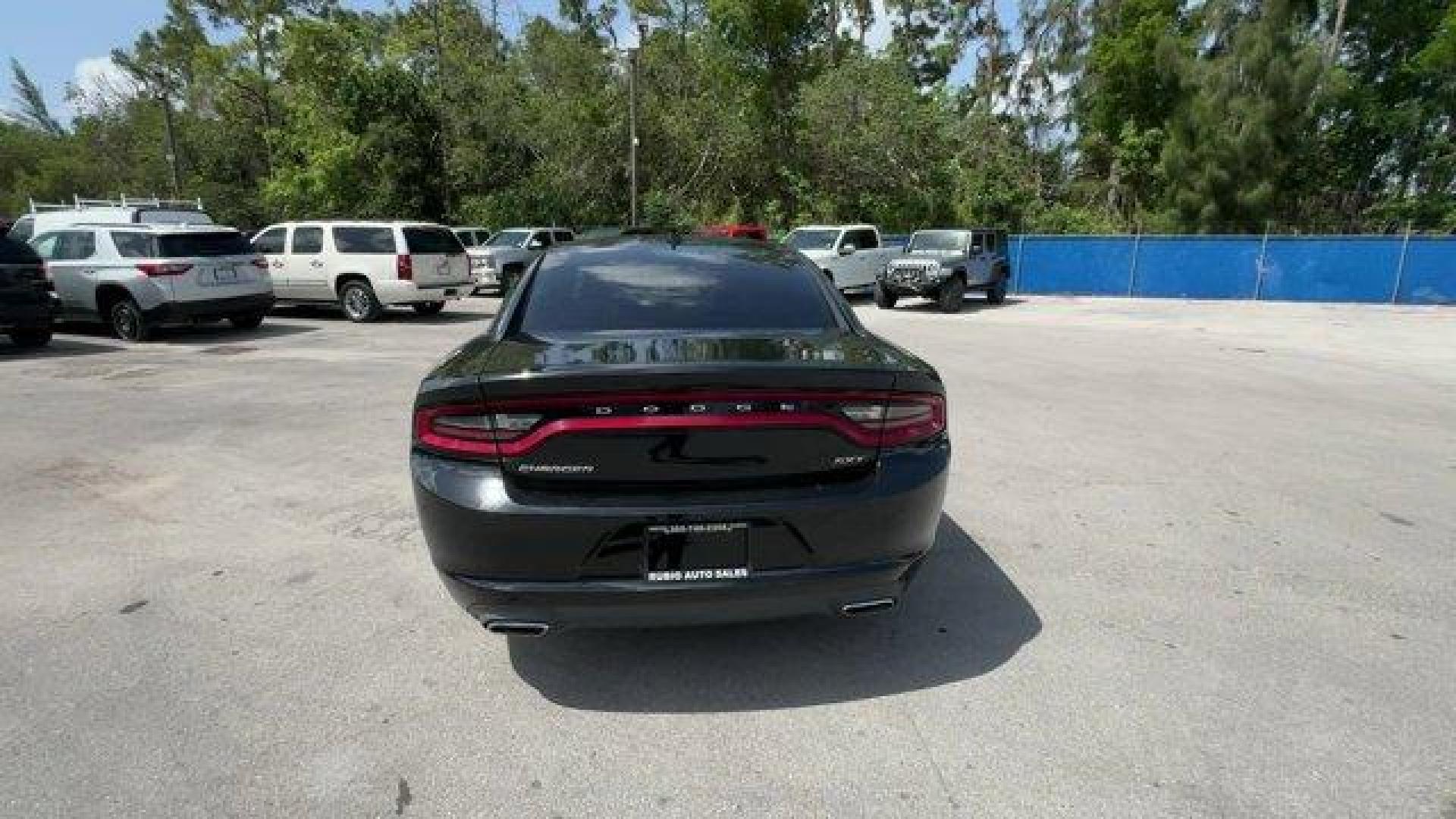 2016 Pitch Black Clearcoat /Black Dodge Charger (2C3CDXHG3GH) with an 6 3.6 L engine, Automatic transmission, located at 27610 S Dixie Hwy, Homestead, FL, 33032, (305) 749-2348, 25.510241, -80.438301 - KBB.com 10 Best Used Cars Under $20,000. Boasts 31 Highway MPG and 19 City MPG! This Dodge Charger boasts a Regular Unleaded V-6 3.6 L/220 engine powering this Automatic transmission. WHEELS: 18 X 7.5 CAST ALUMINUM (STD), TRANSMISSION: 8-SPEED AUTO (8HP45) (STD), TIRES: P235/55R18 AS PERFORMANCE (ST - Photo#3