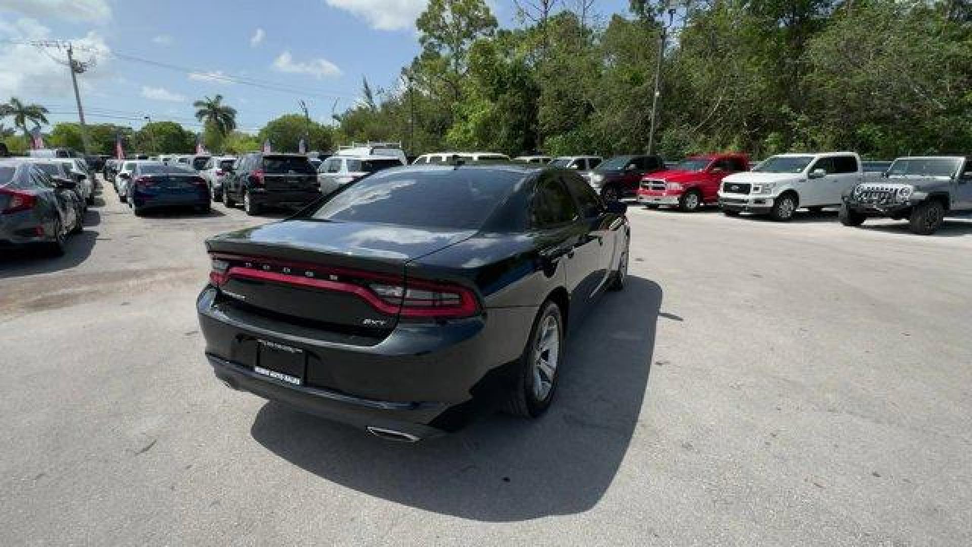 2016 Pitch Black Clearcoat /Black Dodge Charger (2C3CDXHG3GH) with an 6 3.6 L engine, Automatic transmission, located at 27610 S Dixie Hwy, Homestead, FL, 33032, (305) 749-2348, 25.510241, -80.438301 - KBB.com 10 Best Used Cars Under $20,000. Boasts 31 Highway MPG and 19 City MPG! This Dodge Charger boasts a Regular Unleaded V-6 3.6 L/220 engine powering this Automatic transmission. WHEELS: 18 X 7.5 CAST ALUMINUM (STD), TRANSMISSION: 8-SPEED AUTO (8HP45) (STD), TIRES: P235/55R18 AS PERFORMANCE (ST - Photo#4