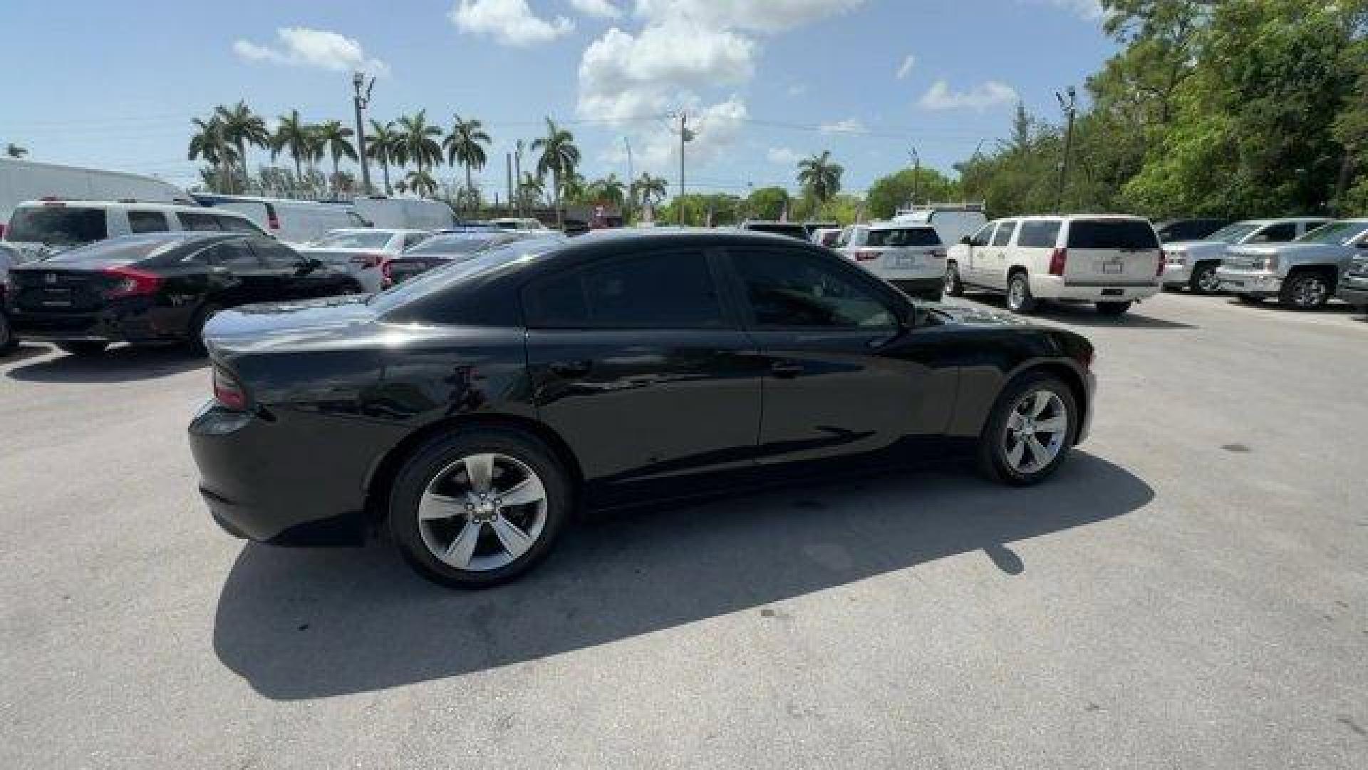 2016 Pitch Black Clearcoat /Black Dodge Charger (2C3CDXHG3GH) with an 6 3.6 L engine, Automatic transmission, located at 27610 S Dixie Hwy, Homestead, FL, 33032, (305) 749-2348, 25.510241, -80.438301 - KBB.com 10 Best Used Cars Under $20,000. Boasts 31 Highway MPG and 19 City MPG! This Dodge Charger boasts a Regular Unleaded V-6 3.6 L/220 engine powering this Automatic transmission. WHEELS: 18 X 7.5 CAST ALUMINUM (STD), TRANSMISSION: 8-SPEED AUTO (8HP45) (STD), TIRES: P235/55R18 AS PERFORMANCE (ST - Photo#5