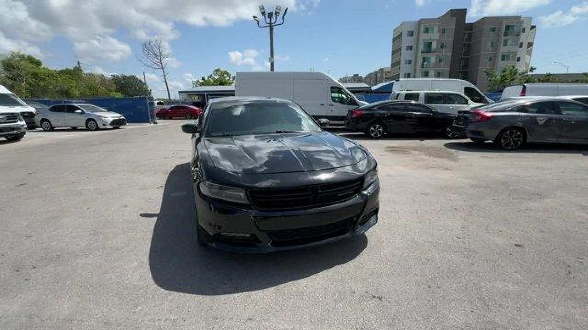 2016 Pitch Black Clearcoat /Black Dodge Charger (2C3CDXHG3GH) with an 6 3.6 L engine, Automatic transmission, located at 27610 S Dixie Hwy, Homestead, FL, 33032, (305) 749-2348, 25.510241, -80.438301 - KBB.com 10 Best Used Cars Under $20,000. Boasts 31 Highway MPG and 19 City MPG! This Dodge Charger boasts a Regular Unleaded V-6 3.6 L/220 engine powering this Automatic transmission. WHEELS: 18 X 7.5 CAST ALUMINUM (STD), TRANSMISSION: 8-SPEED AUTO (8HP45) (STD), TIRES: P235/55R18 AS PERFORMANCE (ST - Photo#7