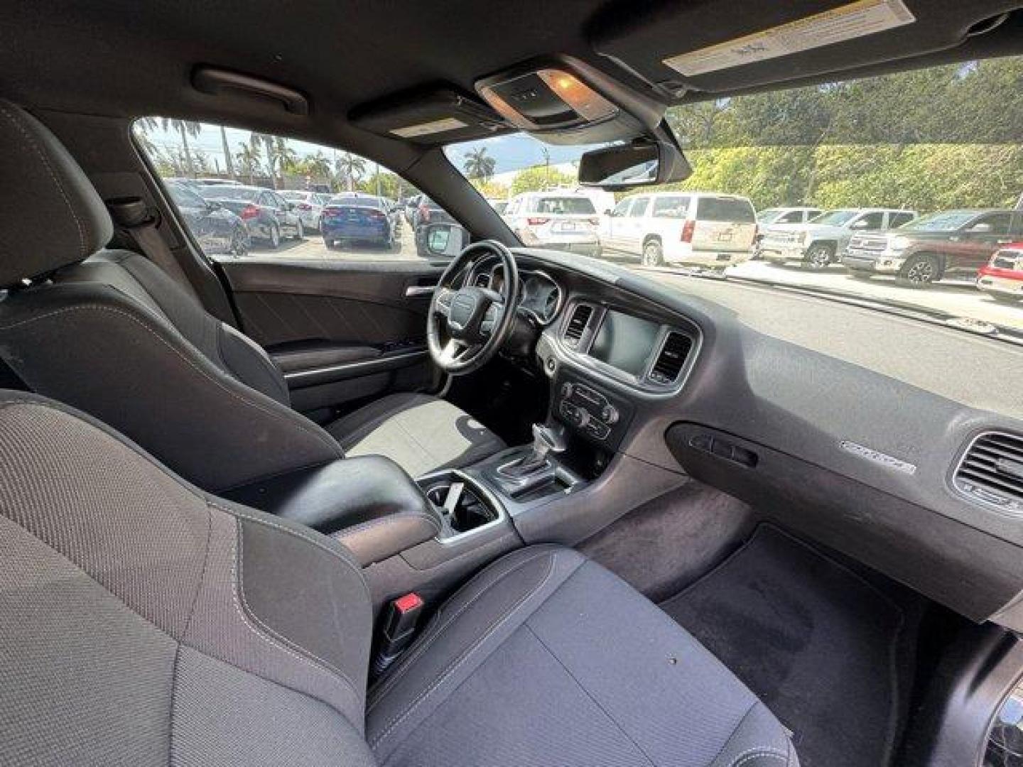 2016 Pitch Black Clearcoat /Black Dodge Charger (2C3CDXHG3GH) with an 6 3.6 L engine, Automatic transmission, located at 27610 S Dixie Hwy, Homestead, FL, 33032, (305) 749-2348, 25.510241, -80.438301 - KBB.com 10 Best Used Cars Under $20,000. Boasts 31 Highway MPG and 19 City MPG! This Dodge Charger boasts a Regular Unleaded V-6 3.6 L/220 engine powering this Automatic transmission. WHEELS: 18 X 7.5 CAST ALUMINUM (STD), TRANSMISSION: 8-SPEED AUTO (8HP45) (STD), TIRES: P235/55R18 AS PERFORMANCE (ST - Photo#11