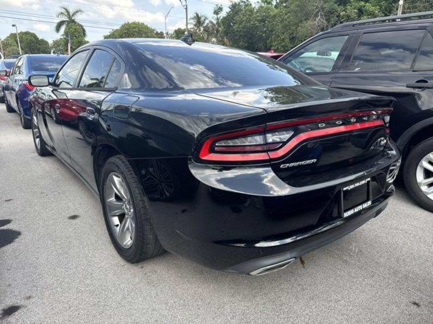2016 Pitch Black Clearcoat /Black Dodge Charger (2C3CDXHG3GH) with an 6 3.6 L engine, Automatic transmission, located at 27610 S Dixie Hwy, Homestead, FL, 33032, (305) 749-2348, 25.510241, -80.438301 - KBB.com 10 Best Used Cars Under $20,000. Boasts 31 Highway MPG and 19 City MPG! This Dodge Charger boasts a Regular Unleaded V-6 3.6 L/220 engine powering this Automatic transmission. WHEELS: 18 X 7.5 CAST ALUMINUM (STD), TRANSMISSION: 8-SPEED AUTO (8HP45) (STD), TIRES: P235/55R18 AS PERFORMANCE (ST - Photo#1