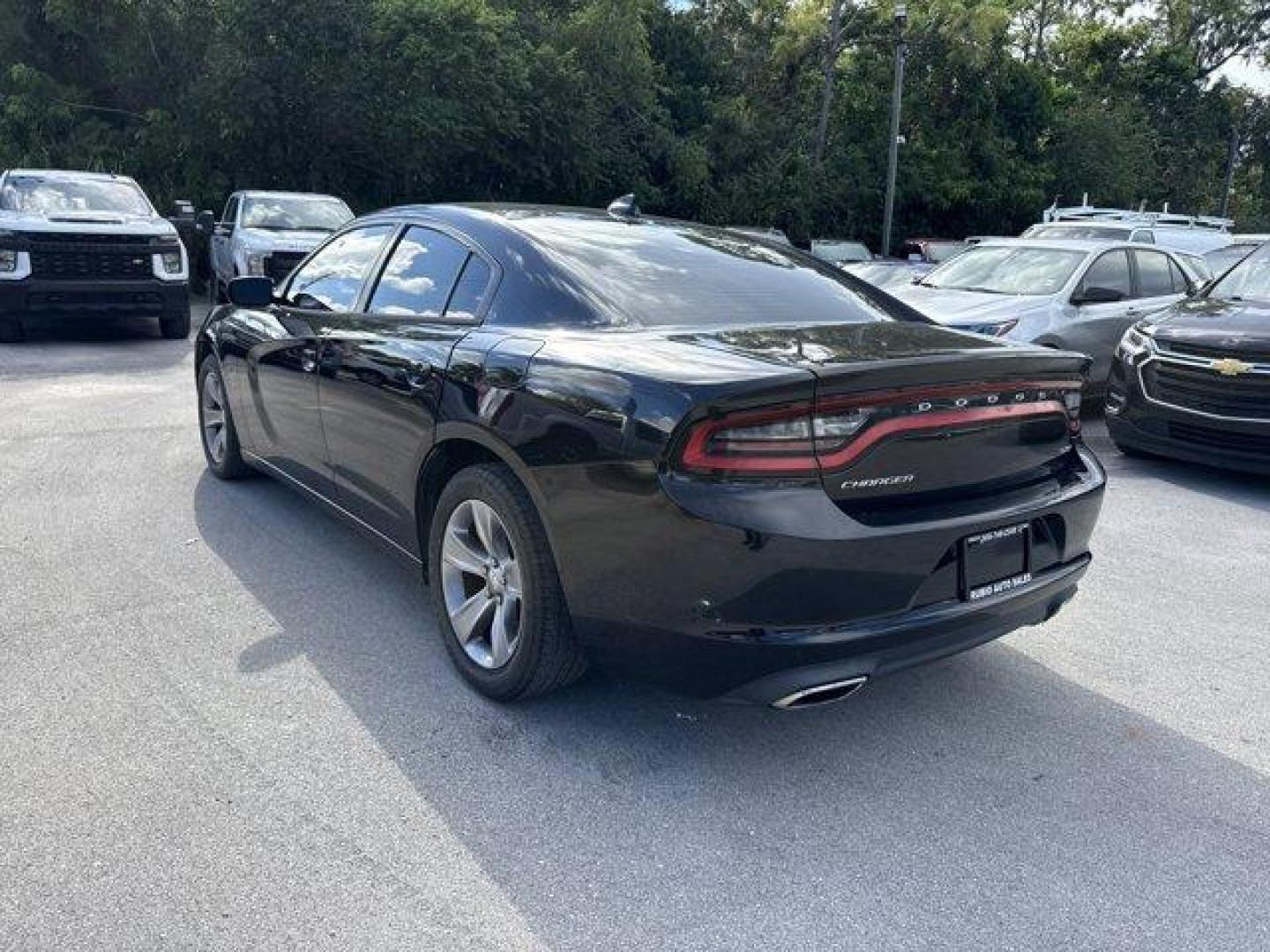 2016 Pitch Black Clearcoat /Black Dodge Charger (2C3CDXHG3GH) with an 6 3.6 L engine, Automatic transmission, located at 27610 S Dixie Hwy, Homestead, FL, 33032, (305) 749-2348, 25.510241, -80.438301 - KBB.com 10 Best Used Cars Under $20,000. Boasts 31 Highway MPG and 19 City MPG! This Dodge Charger boasts a Regular Unleaded V-6 3.6 L/220 engine powering this Automatic transmission. WHEELS: 18 X 7.5 CAST ALUMINUM (STD), TRANSMISSION: 8-SPEED AUTO (8HP45) (STD), TIRES: P235/55R18 AS PERFORMANCE (ST - Photo#2