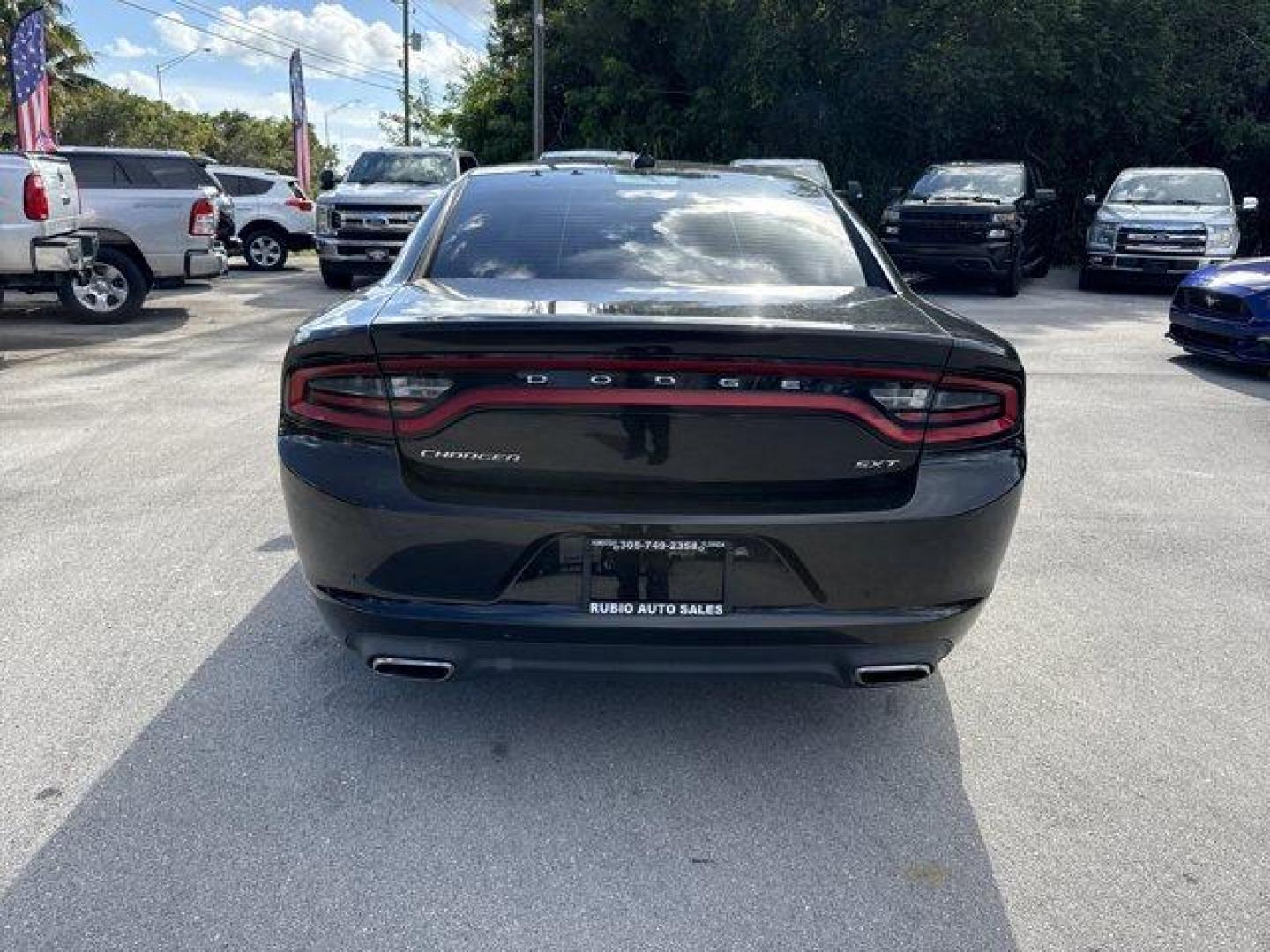 2016 Pitch Black Clearcoat /Black Dodge Charger (2C3CDXHG3GH) with an 6 3.6 L engine, Automatic transmission, located at 27610 S Dixie Hwy, Homestead, FL, 33032, (305) 749-2348, 25.510241, -80.438301 - KBB.com 10 Best Used Cars Under $20,000. Boasts 31 Highway MPG and 19 City MPG! This Dodge Charger boasts a Regular Unleaded V-6 3.6 L/220 engine powering this Automatic transmission. WHEELS: 18 X 7.5 CAST ALUMINUM (STD), TRANSMISSION: 8-SPEED AUTO (8HP45) (STD), TIRES: P235/55R18 AS PERFORMANCE (ST - Photo#3
