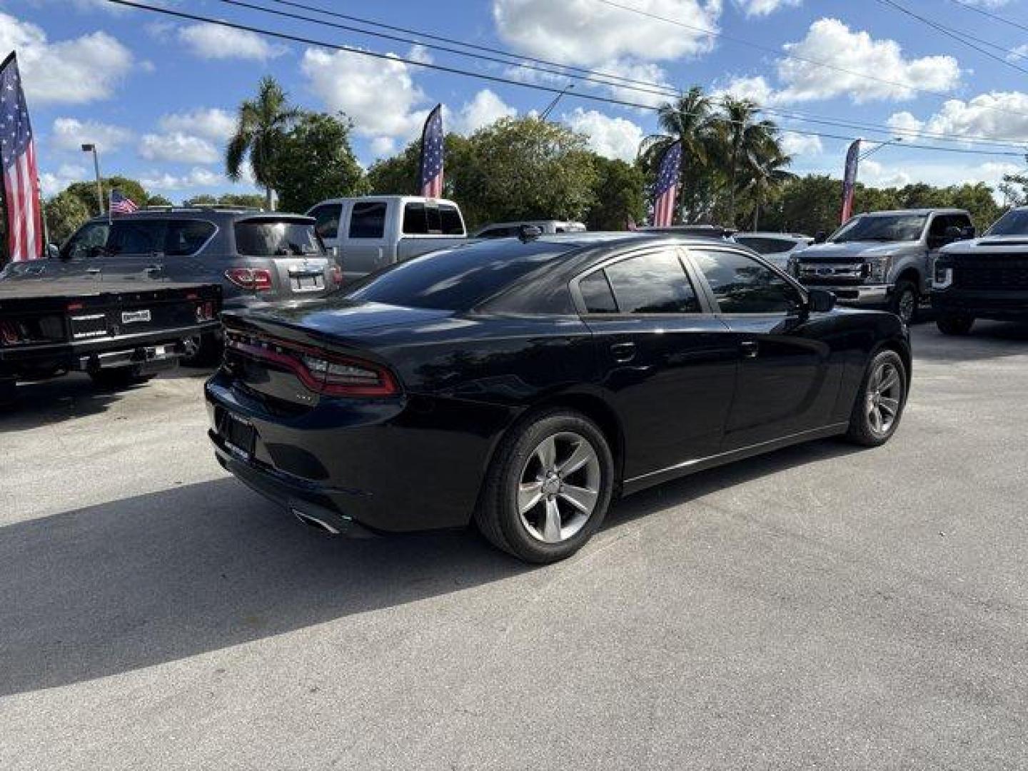 2016 Pitch Black Clearcoat /Black Dodge Charger (2C3CDXHG3GH) with an 6 3.6 L engine, Automatic transmission, located at 27610 S Dixie Hwy, Homestead, FL, 33032, (305) 749-2348, 25.510241, -80.438301 - KBB.com 10 Best Used Cars Under $20,000. Boasts 31 Highway MPG and 19 City MPG! This Dodge Charger boasts a Regular Unleaded V-6 3.6 L/220 engine powering this Automatic transmission. WHEELS: 18 X 7.5 CAST ALUMINUM (STD), TRANSMISSION: 8-SPEED AUTO (8HP45) (STD), TIRES: P235/55R18 AS PERFORMANCE (ST - Photo#4