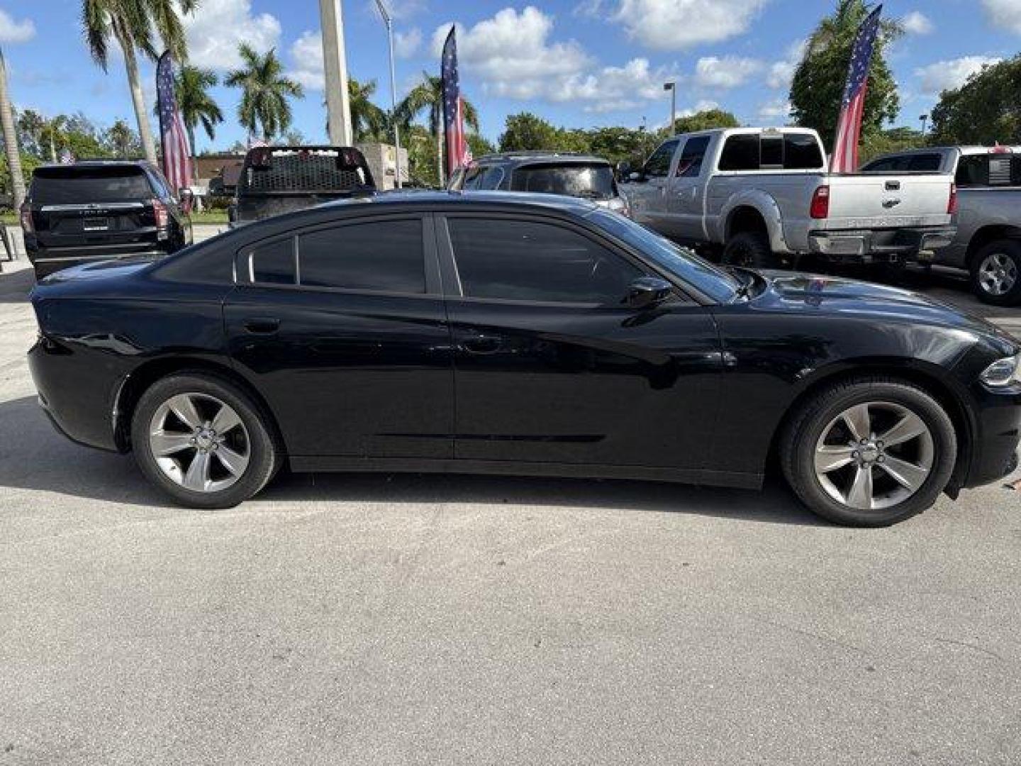 2016 Pitch Black Clearcoat /Black Dodge Charger (2C3CDXHG3GH) with an 6 3.6 L engine, Automatic transmission, located at 27610 S Dixie Hwy, Homestead, FL, 33032, (305) 749-2348, 25.510241, -80.438301 - KBB.com 10 Best Used Cars Under $20,000. Boasts 31 Highway MPG and 19 City MPG! This Dodge Charger boasts a Regular Unleaded V-6 3.6 L/220 engine powering this Automatic transmission. WHEELS: 18 X 7.5 CAST ALUMINUM (STD), TRANSMISSION: 8-SPEED AUTO (8HP45) (STD), TIRES: P235/55R18 AS PERFORMANCE (ST - Photo#5
