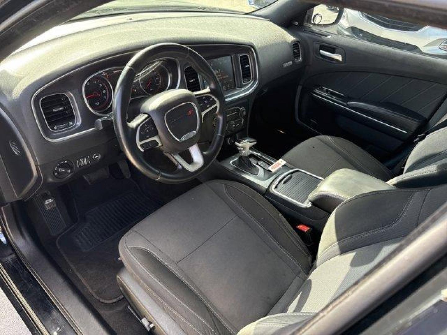 2016 Pitch Black Clearcoat /Black Dodge Charger (2C3CDXHG3GH) with an 6 3.6 L engine, Automatic transmission, located at 27610 S Dixie Hwy, Homestead, FL, 33032, (305) 749-2348, 25.510241, -80.438301 - KBB.com 10 Best Used Cars Under $20,000. Boasts 31 Highway MPG and 19 City MPG! This Dodge Charger boasts a Regular Unleaded V-6 3.6 L/220 engine powering this Automatic transmission. WHEELS: 18 X 7.5 CAST ALUMINUM (STD), TRANSMISSION: 8-SPEED AUTO (8HP45) (STD), TIRES: P235/55R18 AS PERFORMANCE (ST - Photo#10