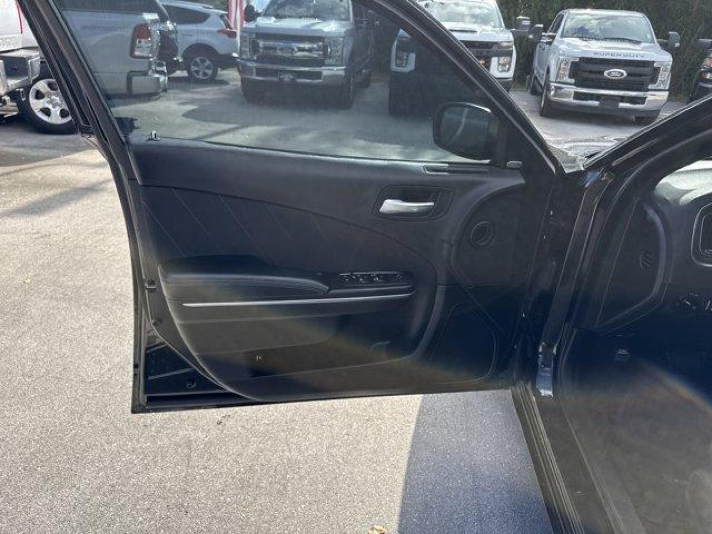 2016 Pitch Black Clearcoat /Black Dodge Charger (2C3CDXHG3GH) with an 6 3.6 L engine, Automatic transmission, located at 27610 S Dixie Hwy, Homestead, FL, 33032, (305) 749-2348, 25.510241, -80.438301 - KBB.com 10 Best Used Cars Under $20,000. Boasts 31 Highway MPG and 19 City MPG! This Dodge Charger boasts a Regular Unleaded V-6 3.6 L/220 engine powering this Automatic transmission. WHEELS: 18 X 7.5 CAST ALUMINUM (STD), TRANSMISSION: 8-SPEED AUTO (8HP45) (STD), TIRES: P235/55R18 AS PERFORMANCE (ST - Photo#12