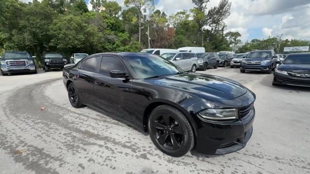 2016 Pitch Black Clearcoat /Black Dodge Charger (2C3CDXHG3GH) with an 6 3.6 L engine, Automatic transmission, located at 27610 S Dixie Hwy, Homestead, FL, 33032, (305) 749-2348, 25.510241, -80.438301 - KBB.com 10 Best Used Cars Under $20,000. Boasts 31 Highway MPG and 19 City MPG! This Dodge Charger boasts a Regular Unleaded V-6 3.6 L/220 engine powering this Automatic transmission. WHEELS: 18 X 7.5 CAST ALUMINUM (STD), TRANSMISSION: 8-SPEED AUTO (8HP45) (STD), TIRES: P235/55R18 AS PERFORMANCE (ST- Photo#6