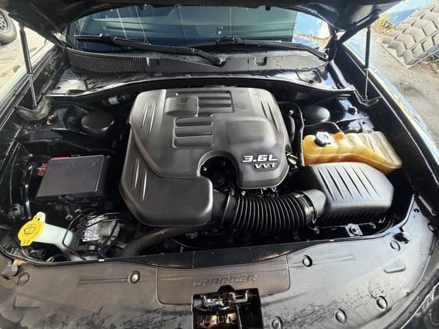 2016 Pitch Black Clearcoat /Black Dodge Charger (2C3CDXHG3GH) with an 6 3.6 L engine, Automatic transmission, located at 27610 S Dixie Hwy, Homestead, FL, 33032, (305) 749-2348, 25.510241, -80.438301 - KBB.com 10 Best Used Cars Under $20,000. Boasts 31 Highway MPG and 19 City MPG! This Dodge Charger boasts a Regular Unleaded V-6 3.6 L/220 engine powering this Automatic transmission. WHEELS: 18 X 7.5 CAST ALUMINUM (STD), TRANSMISSION: 8-SPEED AUTO (8HP45) (STD), TIRES: P235/55R18 AS PERFORMANCE (ST- Photo#15