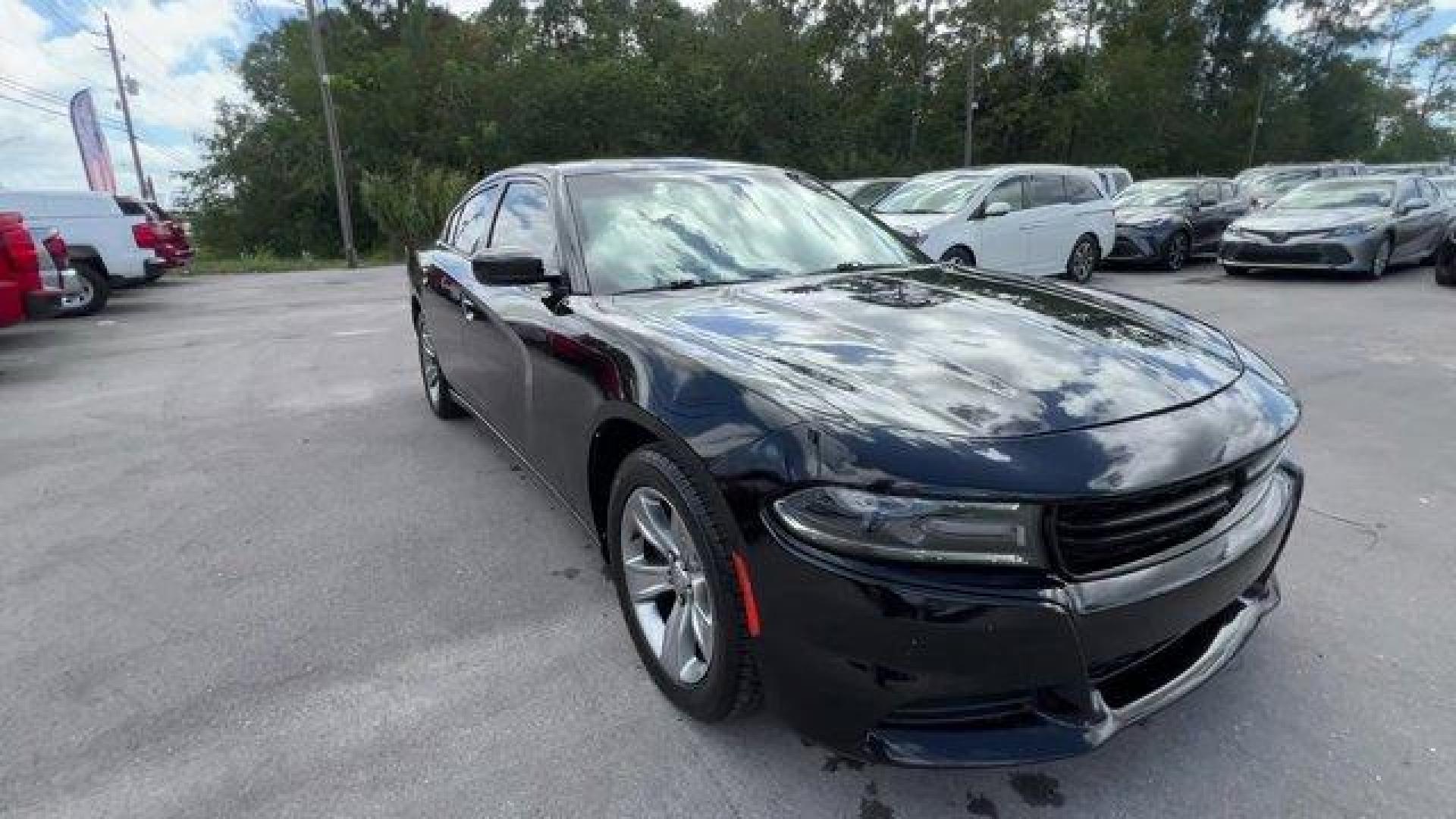 2016 Pitch Black Clearcoat /Black Dodge Charger (2C3CDXHG3GH) with an 6 3.6 L engine, Automatic transmission, located at 27610 S Dixie Hwy, Homestead, FL, 33032, (305) 749-2348, 25.510241, -80.438301 - KBB.com 10 Best Used Cars Under $20,000. Boasts 31 Highway MPG and 19 City MPG! This Dodge Charger boasts a Regular Unleaded V-6 3.6 L/220 engine powering this Automatic transmission. WHEELS: 18 X 7.5 CAST ALUMINUM (STD), TRANSMISSION: 8-SPEED AUTO (8HP45) (STD), TIRES: P235/55R18 AS PERFORMANCE (ST - Photo#5