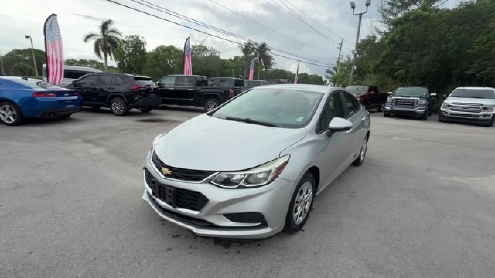 2017 Silver Ice Metallic /Dark Atmosphere/Medium Atmosphere Chevrolet Cruze (3G1BC5SM6HS) with an 4 1.4L engine, Automatic transmission, located at 27610 S Dixie Hwy, Homestead, FL, 33032, (305) 749-2348, 25.510241, -80.438301 - KBB.com 10 Most Awarded Brands. Only 23,357 Miles! Scores 40 Highway MPG and 30 City MPG! This Chevrolet Cruze boasts a Turbocharged Gas I4 1.4L/ engine powering this Automatic transmission. TRANSMISSION, 6-SPEED AUTOMATIC (STD), SILVER ICE METALLIC, SEATS, FRONT BUCKET WITH RECLINING SEATBACKS AND- Photo#0
