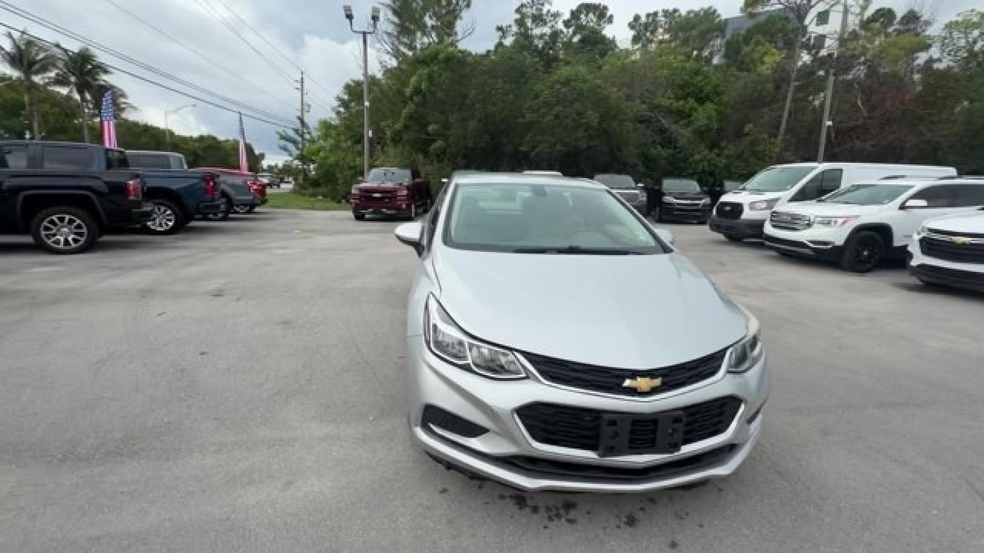 2017 Silver Ice Metallic /Dark Atmosphere/Medium Atmosphere Chevrolet Cruze (3G1BC5SM6HS) with an 4 1.4L engine, Automatic transmission, located at 27610 S Dixie Hwy, Homestead, FL, 33032, (305) 749-2348, 25.510241, -80.438301 - KBB.com 10 Most Awarded Brands. Only 23,357 Miles! Scores 40 Highway MPG and 30 City MPG! This Chevrolet Cruze boasts a Turbocharged Gas I4 1.4L/ engine powering this Automatic transmission. TRANSMISSION, 6-SPEED AUTOMATIC (STD), SILVER ICE METALLIC, SEATS, FRONT BUCKET WITH RECLINING SEATBACKS AND- Photo#7