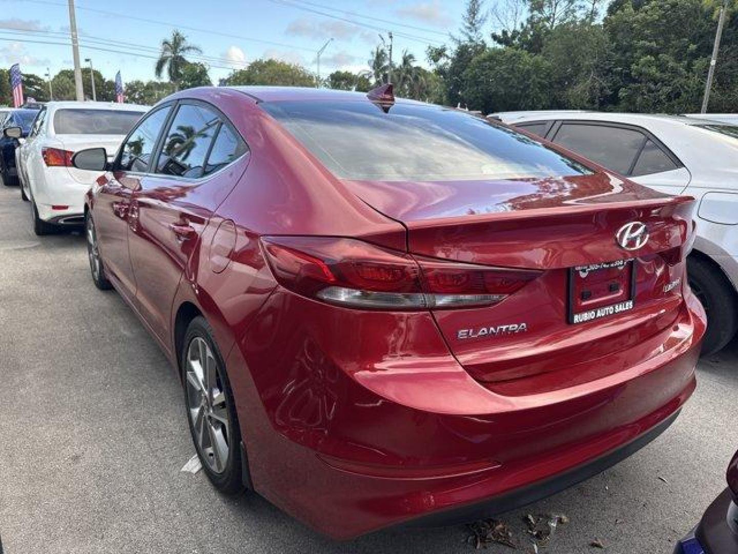 2018 Scarlet Red Pearl /Gray Hyundai Elantra (KMHD84LF9JU) with an 4 2.0 L engine, Automatic transmission, located at 27610 S Dixie Hwy, Homestead, FL, 33032, (305) 749-2348, 25.510241, -80.438301 - KBB.com 10 Best Sedans Under $25,000. Scores 37 Highway MPG and 28 City MPG! This Hyundai Elantra boasts a Regular Unleaded I-4 2.0 L/122 engine powering this Automatic transmission. SCARLET RED PEARL, REVERSIBLE CARGO TRAY, REAR BUMPER APPLIQUE.*This Hyundai Elantra Comes Equipped with These Option - Photo#1