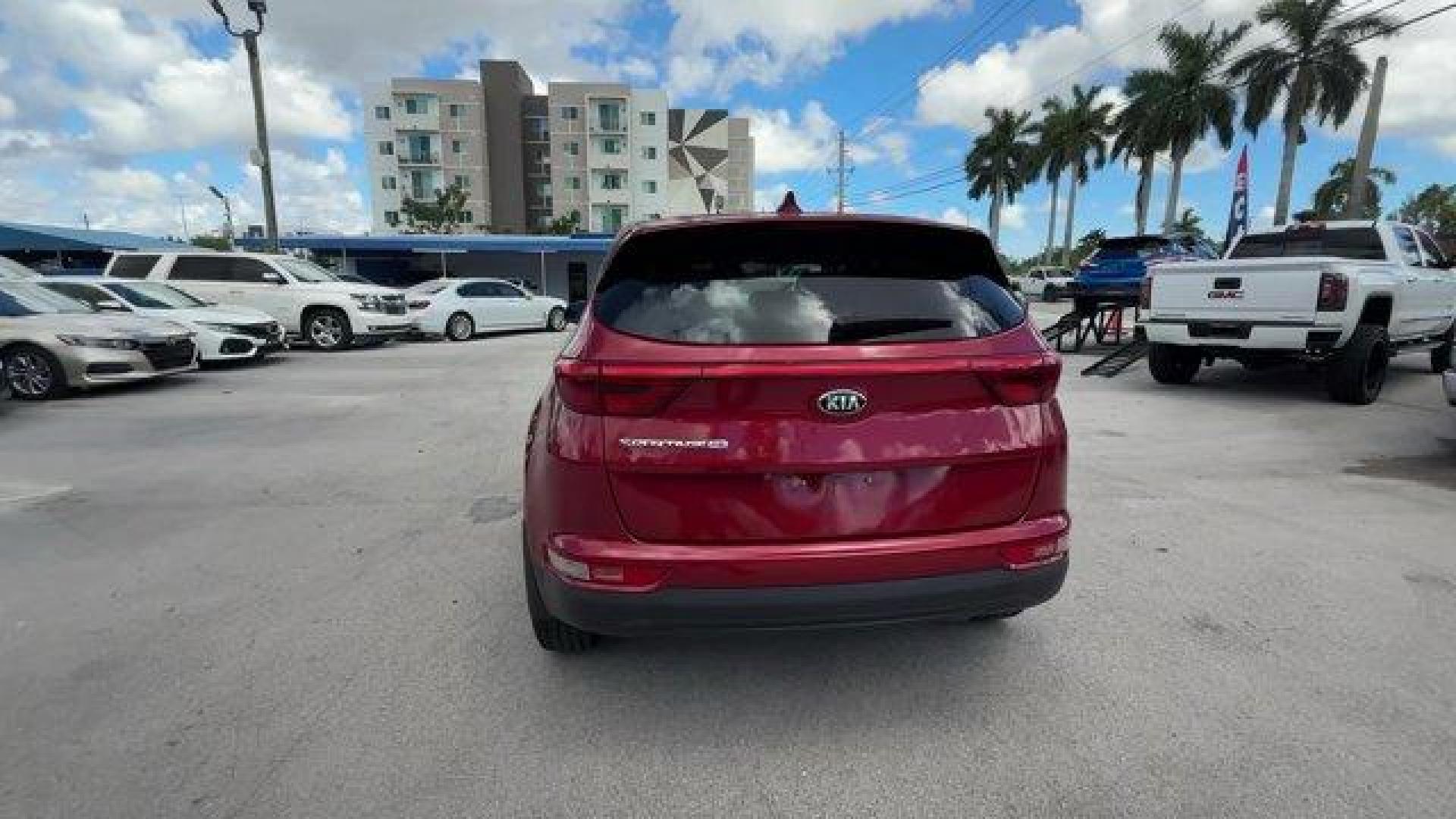 2017 Hyper Red /Black Kia Sportage (KNDPM3AC6H7) with an 4 2.4 L engine, Automatic transmission, located at 27610 S Dixie Hwy, Homestead, FL, 33032, (305) 749-2348, 25.510241, -80.438301 - IIHS Top Safety Pick, Top Safety Pick+. Delivers 30 Highway MPG and 23 City MPG! This Kia Sportage boasts a Regular Unleaded I-4 2.4 L/144 engine powering this Automatic transmission. WHEEL LOCKS, HYPER RED, CARPET FLOOR MATS.* This Kia Sportage Features the Following Options *BLACK, CLOTH SEAT TRIM - Photo#3