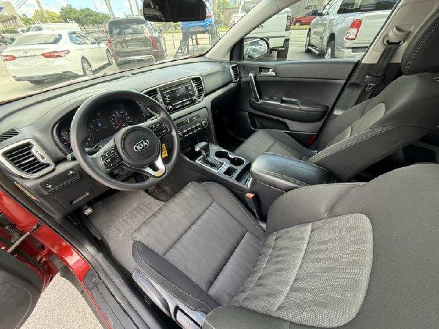 2017 Hyper Red /Black Kia Sportage (KNDPM3AC6H7) with an 4 2.4 L engine, Automatic transmission, located at 27610 S Dixie Hwy, Homestead, FL, 33032, (305) 749-2348, 25.510241, -80.438301 - IIHS Top Safety Pick, Top Safety Pick+. Delivers 30 Highway MPG and 23 City MPG! This Kia Sportage boasts a Regular Unleaded I-4 2.4 L/144 engine powering this Automatic transmission. WHEEL LOCKS, HYPER RED, CARPET FLOOR MATS.* This Kia Sportage Features the Following Options *BLACK, CLOTH SEAT TRIM - Photo#11