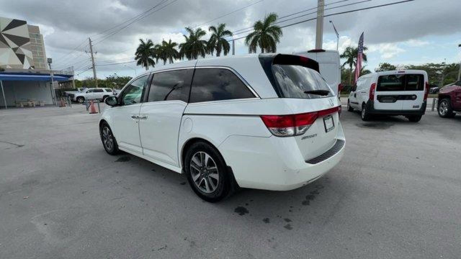2016 White Honda Odyssey (5FNRL5H92GB) with an 6 3.5 L engine, Automatic transmission, located at 27610 S Dixie Hwy, Homestead, FL, 33032, (305) 749-2348, 25.510241, -80.438301 - KBB.com Best Buy Awards. Delivers 28 Highway MPG and 19 City MPG! This Honda Odyssey boasts a Regular Unleaded V-6 3.5 L/212 engine powering this Automatic transmission. Window Grid Antenna, Wheels: 18 x 7 Alloy, VSA Electronic Stability Control (ESC).*This Honda Odyssey Comes Equipped with These Op - Photo#2