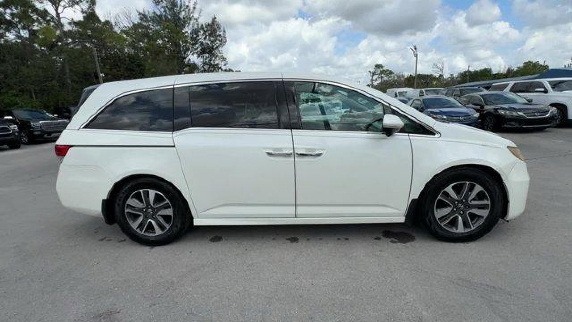 2016 White Honda Odyssey (5FNRL5H92GB) with an 6 3.5 L engine, Automatic transmission, located at 27610 S Dixie Hwy, Homestead, FL, 33032, (305) 749-2348, 25.510241, -80.438301 - KBB.com Best Buy Awards. Delivers 28 Highway MPG and 19 City MPG! This Honda Odyssey boasts a Regular Unleaded V-6 3.5 L/212 engine powering this Automatic transmission. Window Grid Antenna, Wheels: 18 x 7 Alloy, VSA Electronic Stability Control (ESC).*This Honda Odyssey Comes Equipped with These Op - Photo#5