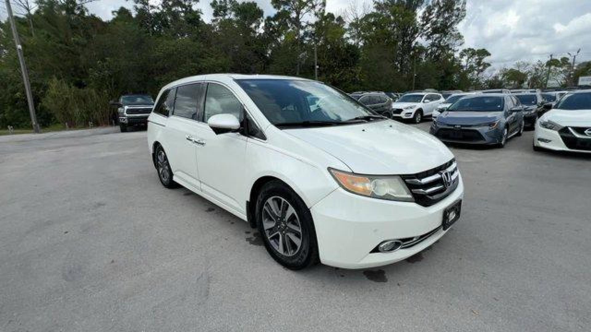 2016 White Honda Odyssey (5FNRL5H92GB) with an 6 3.5 L engine, Automatic transmission, located at 27610 S Dixie Hwy, Homestead, FL, 33032, (305) 749-2348, 25.510241, -80.438301 - KBB.com Best Buy Awards. Delivers 28 Highway MPG and 19 City MPG! This Honda Odyssey boasts a Regular Unleaded V-6 3.5 L/212 engine powering this Automatic transmission. Window Grid Antenna, Wheels: 18 x 7 Alloy, VSA Electronic Stability Control (ESC).*This Honda Odyssey Comes Equipped with These Op - Photo#6