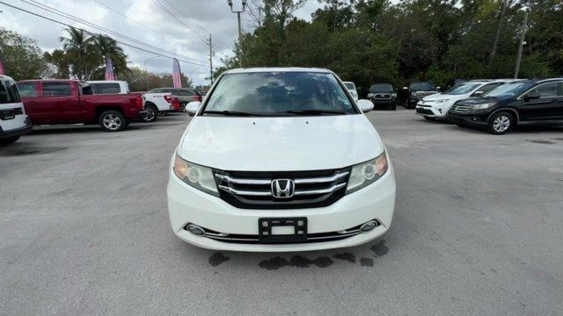 2016 White Honda Odyssey (5FNRL5H92GB) with an 6 3.5 L engine, Automatic transmission, located at 27610 S Dixie Hwy, Homestead, FL, 33032, (305) 749-2348, 25.510241, -80.438301 - KBB.com Best Buy Awards. Delivers 28 Highway MPG and 19 City MPG! This Honda Odyssey boasts a Regular Unleaded V-6 3.5 L/212 engine powering this Automatic transmission. Window Grid Antenna, Wheels: 18 x 7 Alloy, VSA Electronic Stability Control (ESC).*This Honda Odyssey Comes Equipped with These Op - Photo#7