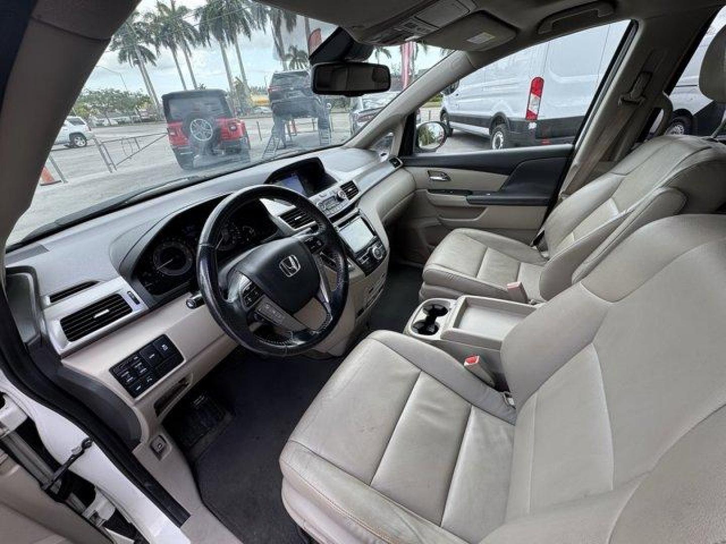 2016 White Honda Odyssey (5FNRL5H92GB) with an 6 3.5 L engine, Automatic transmission, located at 27610 S Dixie Hwy, Homestead, FL, 33032, (305) 749-2348, 25.510241, -80.438301 - KBB.com Best Buy Awards. Delivers 28 Highway MPG and 19 City MPG! This Honda Odyssey boasts a Regular Unleaded V-6 3.5 L/212 engine powering this Automatic transmission. Window Grid Antenna, Wheels: 18 x 7 Alloy, VSA Electronic Stability Control (ESC).*This Honda Odyssey Comes Equipped with These Op - Photo#10