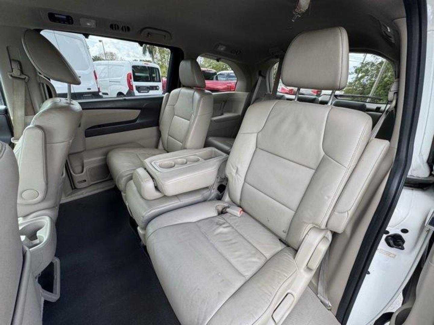2016 White Honda Odyssey (5FNRL5H92GB) with an 6 3.5 L engine, Automatic transmission, located at 27610 S Dixie Hwy, Homestead, FL, 33032, (305) 749-2348, 25.510241, -80.438301 - KBB.com Best Buy Awards. Delivers 28 Highway MPG and 19 City MPG! This Honda Odyssey boasts a Regular Unleaded V-6 3.5 L/212 engine powering this Automatic transmission. Window Grid Antenna, Wheels: 18 x 7 Alloy, VSA Electronic Stability Control (ESC).*This Honda Odyssey Comes Equipped with These Op - Photo#11