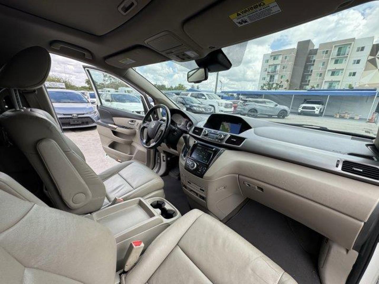 2016 White Honda Odyssey (5FNRL5H92GB) with an 6 3.5 L engine, Automatic transmission, located at 27610 S Dixie Hwy, Homestead, FL, 33032, (305) 749-2348, 25.510241, -80.438301 - KBB.com Best Buy Awards. Delivers 28 Highway MPG and 19 City MPG! This Honda Odyssey boasts a Regular Unleaded V-6 3.5 L/212 engine powering this Automatic transmission. Window Grid Antenna, Wheels: 18 x 7 Alloy, VSA Electronic Stability Control (ESC).*This Honda Odyssey Comes Equipped with These Op - Photo#13