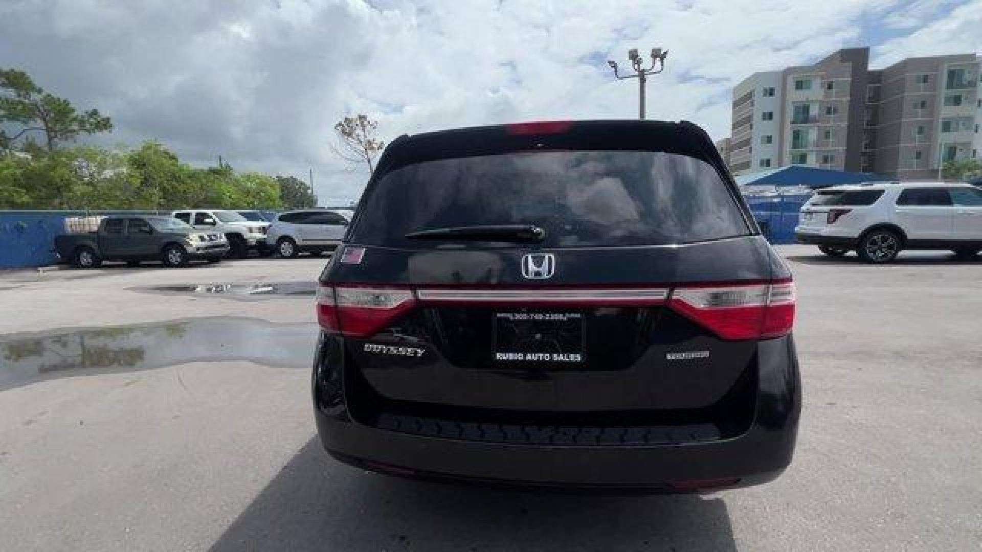 2012 Black Honda Odyssey (5FNRL5H96CB) with an 6 3.5L engine, Automatic transmission, located at 27610 S Dixie Hwy, Homestead, FL, 33032, (305) 749-2348, 25.510241, -80.438301 - KBB.com 10 Best Used Family Cars Under $15,000. Scores 28 Highway MPG and 19 City MPG! This Honda Odyssey boasts a Gas V6 3.5L/212 engine powering this Automatic transmission. XM Radio (subscription required), Wide-mode adjustable 2nd-row seats -inc: leather trimmed outboard seats, multi-function ce - Photo#3