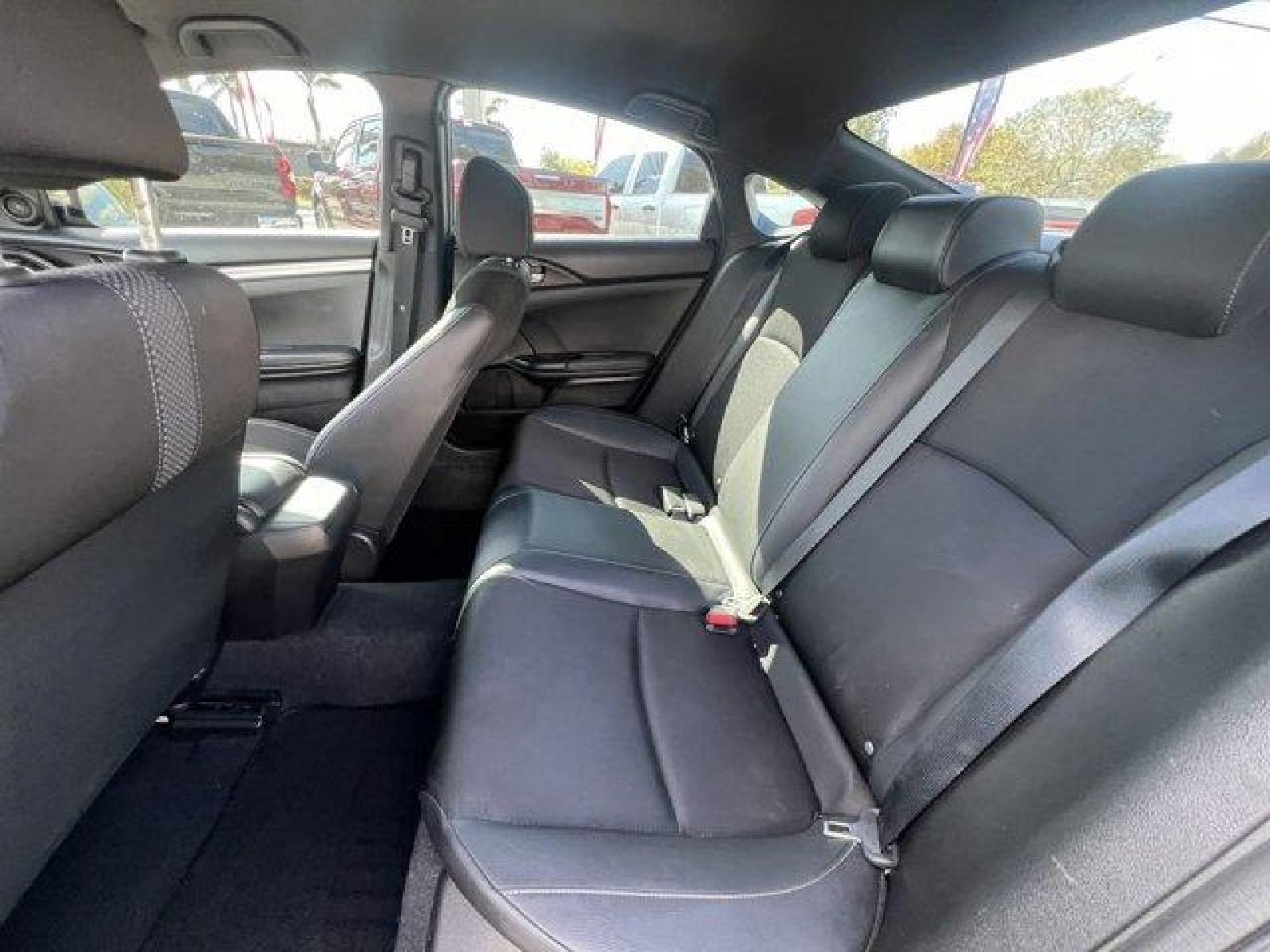 2021 Black Honda Civic Sedan (2HGFC2F85MH) with an 4 2.0 L engine, Variable transmission, located at 27610 S Dixie Hwy, Homestead, FL, 33032, (305) 749-2348, 25.510241, -80.438301 - Boasts 37 Highway MPG and 29 City MPG! This Honda Civic Sedan boasts a Regular Unleaded I-4 2.0 L/122 engine powering this Variable transmission. Window Grid Antenna, Wheels: 18 Alloy w/Gloss Black Inserts, Vehicle Stability Assist (VSA) Electronic Stability Control (ESC).* This Honda Civic Sedan Fe - Photo #13