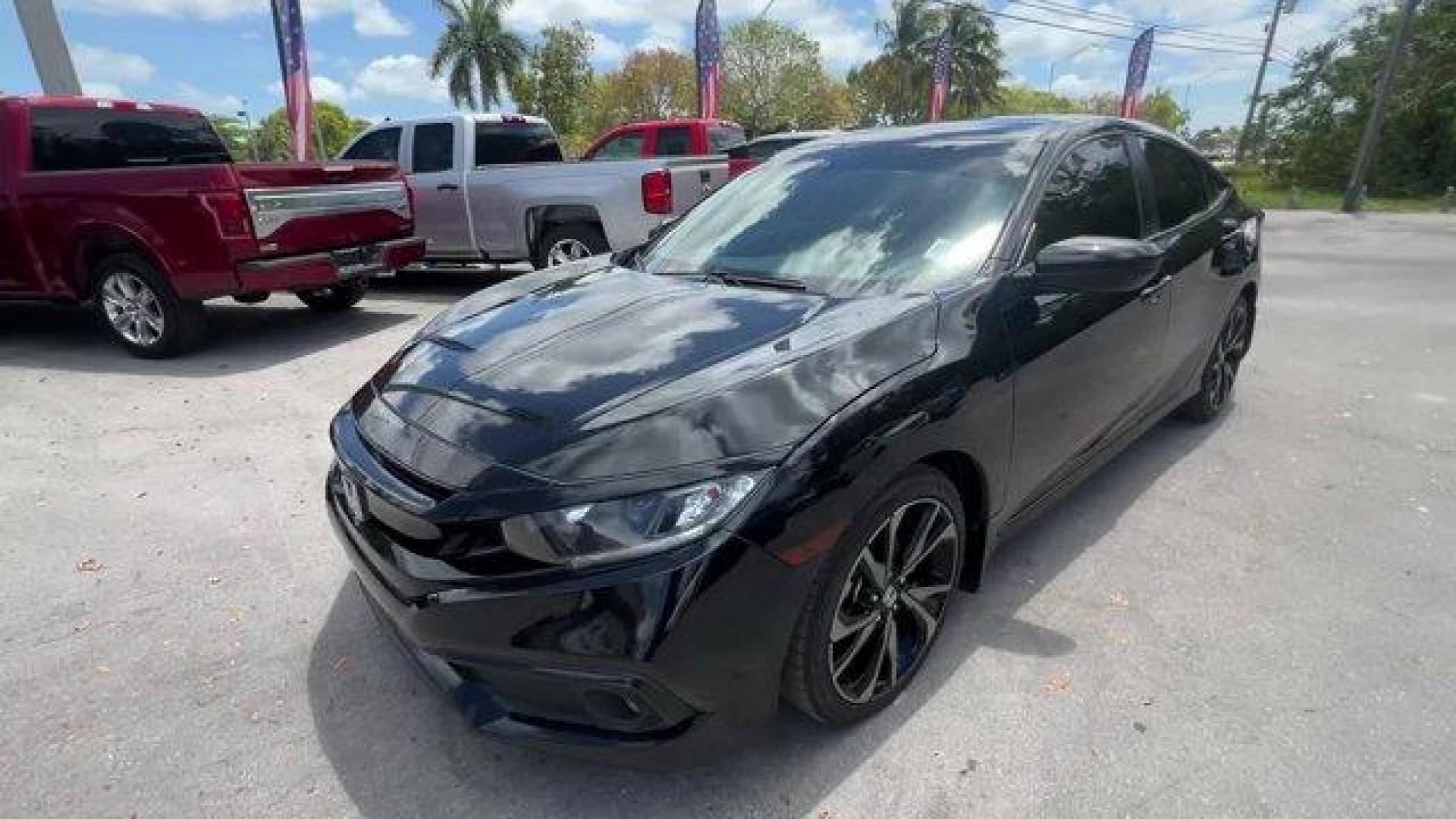 2021 Black Honda Civic Sedan (2HGFC2F85MH) with an 4 2.0 L engine, Variable transmission, located at 27610 S Dixie Hwy, Homestead, FL, 33032, (305) 749-2348, 25.510241, -80.438301 - Boasts 37 Highway MPG and 29 City MPG! This Honda Civic Sedan boasts a Regular Unleaded I-4 2.0 L/122 engine powering this Variable transmission. Window Grid Antenna, Wheels: 18 Alloy w/Gloss Black Inserts, Vehicle Stability Assist (VSA) Electronic Stability Control (ESC).* This Honda Civic Sedan Fe - Photo #0