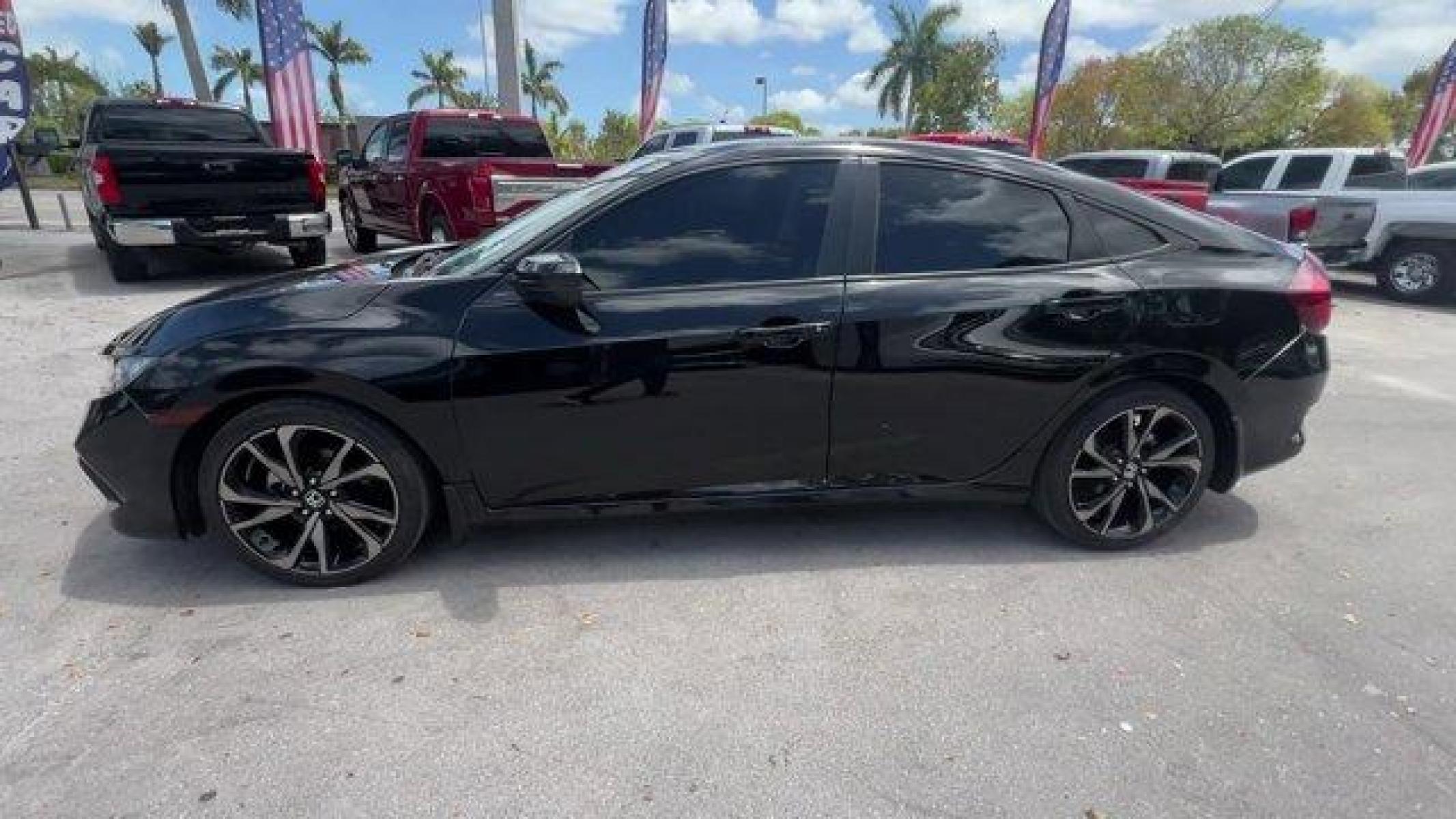 2021 Black Honda Civic Sedan (2HGFC2F85MH) with an 4 2.0 L engine, Variable transmission, located at 27610 S Dixie Hwy, Homestead, FL, 33032, (305) 749-2348, 25.510241, -80.438301 - Boasts 37 Highway MPG and 29 City MPG! This Honda Civic Sedan boasts a Regular Unleaded I-4 2.0 L/122 engine powering this Variable transmission. Window Grid Antenna, Wheels: 18 Alloy w/Gloss Black Inserts, Vehicle Stability Assist (VSA) Electronic Stability Control (ESC).* This Honda Civic Sedan Fe - Photo #1