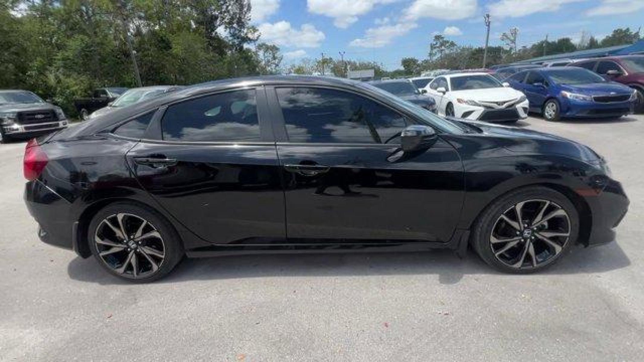 2021 Black Honda Civic Sedan (2HGFC2F85MH) with an 4 2.0 L engine, Variable transmission, located at 27610 S Dixie Hwy, Homestead, FL, 33032, (305) 749-2348, 25.510241, -80.438301 - Boasts 37 Highway MPG and 29 City MPG! This Honda Civic Sedan boasts a Regular Unleaded I-4 2.0 L/122 engine powering this Variable transmission. Window Grid Antenna, Wheels: 18 Alloy w/Gloss Black Inserts, Vehicle Stability Assist (VSA) Electronic Stability Control (ESC).* This Honda Civic Sedan Fe - Photo #5