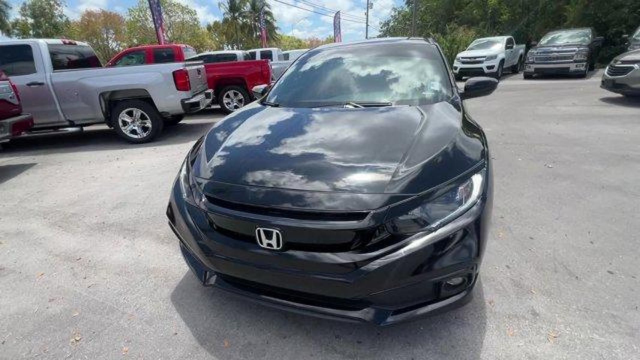 2021 Black Honda Civic Sedan (2HGFC2F85MH) with an 4 2.0 L engine, Variable transmission, located at 27610 S Dixie Hwy, Homestead, FL, 33032, (305) 749-2348, 25.510241, -80.438301 - Boasts 37 Highway MPG and 29 City MPG! This Honda Civic Sedan boasts a Regular Unleaded I-4 2.0 L/122 engine powering this Variable transmission. Window Grid Antenna, Wheels: 18 Alloy w/Gloss Black Inserts, Vehicle Stability Assist (VSA) Electronic Stability Control (ESC).* This Honda Civic Sedan Fe - Photo #7