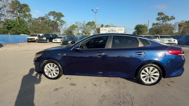 2017 Horizon Blue /Black Kia Optima (5XXGT4L39HG) with an 4 2.4 L engine, Automatic transmission, located at 27610 S Dixie Hwy, Homestead, FL, 33032, (305) 749-2348, 25.510241, -80.438301 - IIHS Top Safety Pick. Scores 36 Highway MPG and 25 City MPG! This Kia Optima boasts a Regular Unleaded I-4 2.4 L/144 engine powering this Automatic transmission. WHEELS: 17 ALLOY -inc: Tires: 17 (Fleet), HORIZON BLUE, CARPETED FLOOR MATS.* This Kia Optima Features the Following Options *BLACK, CLOTH - Photo#0