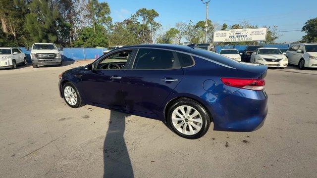2017 Horizon Blue /Black Kia Optima (5XXGT4L39HG) with an 4 2.4 L engine, Automatic transmission, located at 27610 S Dixie Hwy, Homestead, FL, 33032, (305) 749-2348, 25.510241, -80.438301 - IIHS Top Safety Pick. Scores 36 Highway MPG and 25 City MPG! This Kia Optima boasts a Regular Unleaded I-4 2.4 L/144 engine powering this Automatic transmission. WHEELS: 17 ALLOY -inc: Tires: 17 (Fleet), HORIZON BLUE, CARPETED FLOOR MATS.* This Kia Optima Features the Following Options *BLACK, CLOTH - Photo#1
